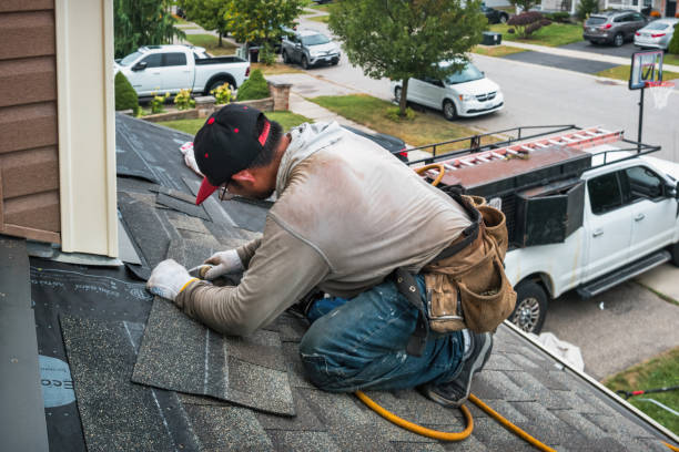 Professional Roofing technician working in North Palm Springs, CA